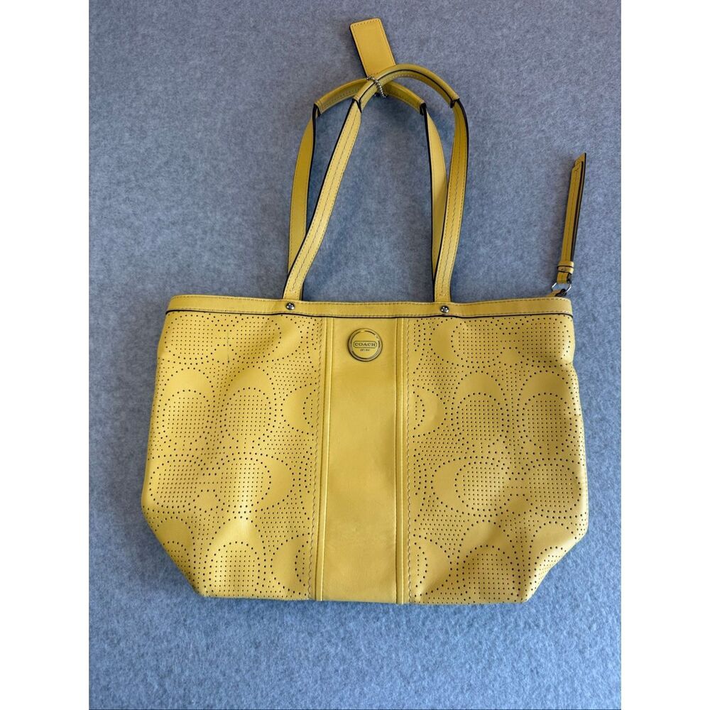 Coach perforated signature leather tote bag yellow